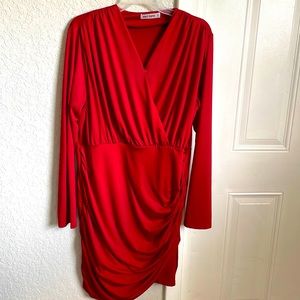 Nice dress for a casual occasion has a tiny spot on the back,barely noticeable.